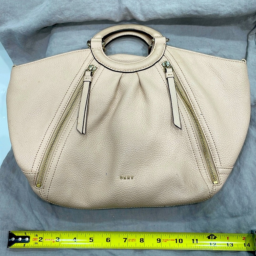DKNY blush pink purse with handles, gold accents and adjustable shoulder strap